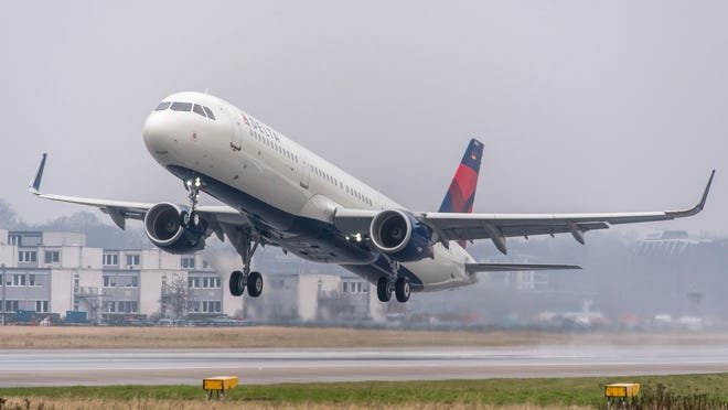 A Delta jet landing. Delta Air Lines