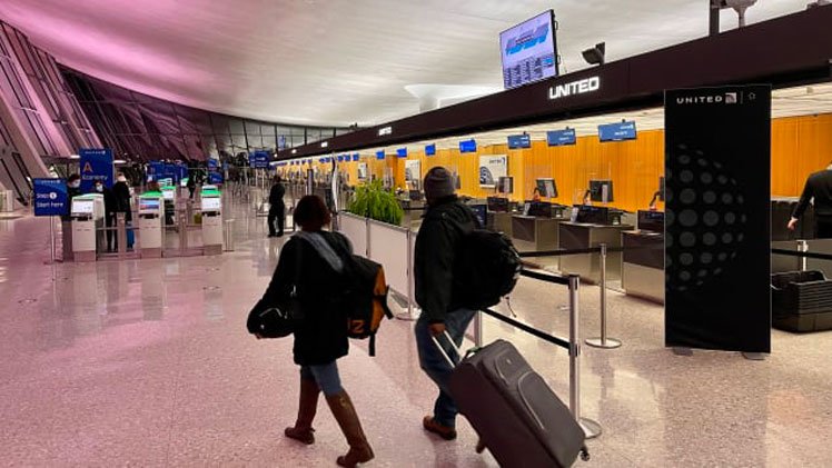 International air travelers are likely to share health information in the future via new apps. Daniel Slim/AFP via Getty Images