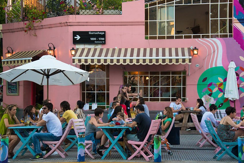 Locals and tourists enjoy an afternoon break at cafes in Palermo